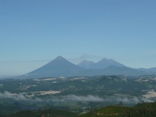 View of the Agua, Fuego and Acatenango volcanoes on the way to El Guatalón and Annexes.